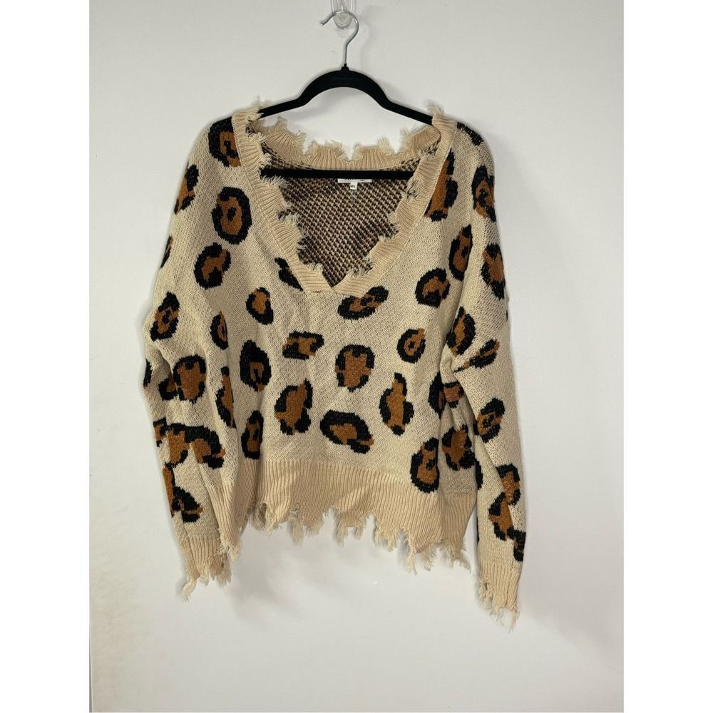Miracle leopard distressed knit sweater